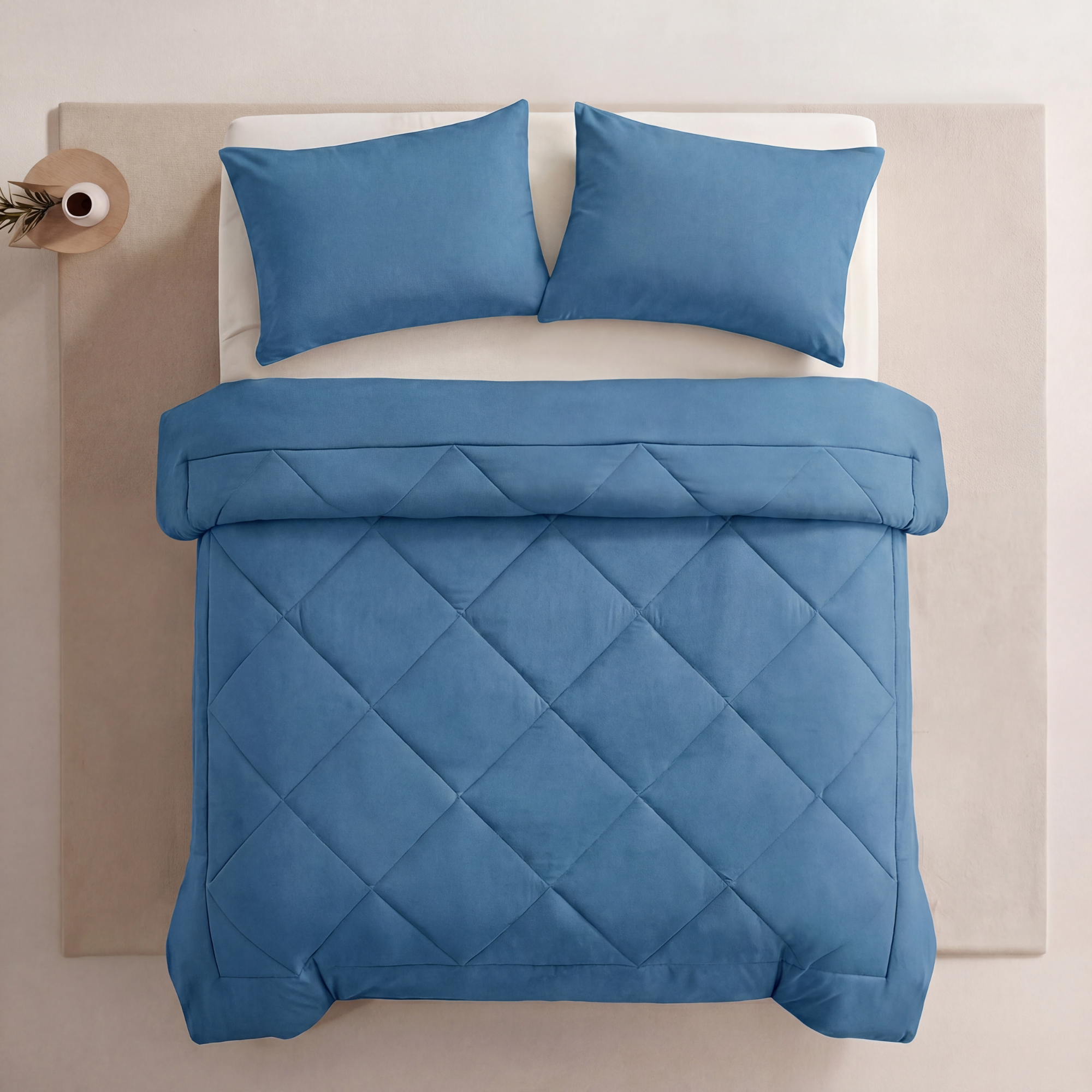 Coastal Blue EasySleep blanket styled on a neutral bed